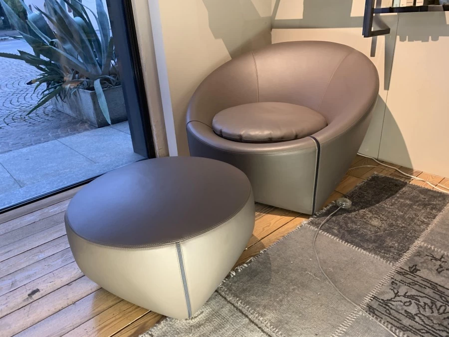 Poltrona con pouf Minotti Capri