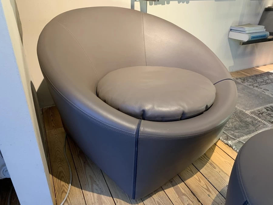 Poltrona con pouf Minotti Capri