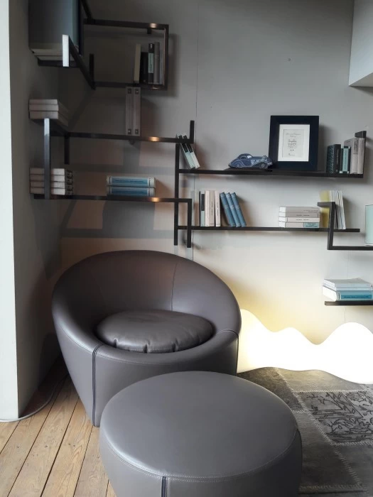 Poltrona con pouf Minotti Capri