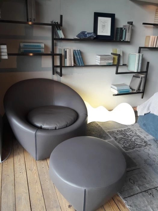 Poltrona con pouf Minotti Capri