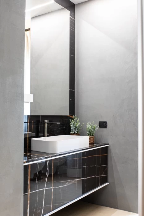 Mobile Bagno Edonè Rea in marmo nero - Vismara Architettura d'interni.