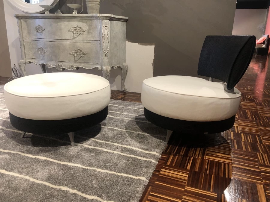 Poltrona con pouf Pierantonio Bonacina Mutabilis