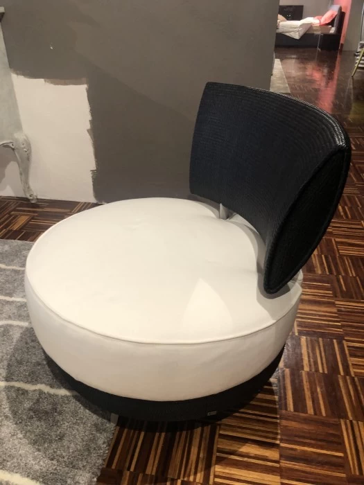 Poltrona con pouf Pierantonio Bonacina Mutabilis