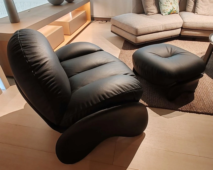 Poltrona con pouf Poltrona Frau Squash