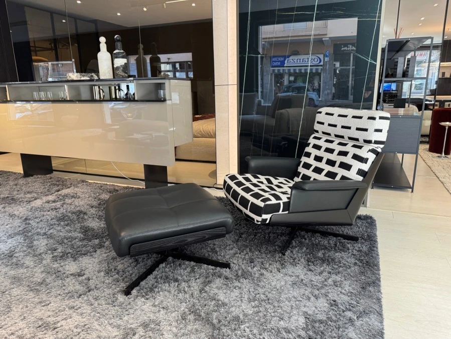 Poltrona con pouf Minotti Daiki